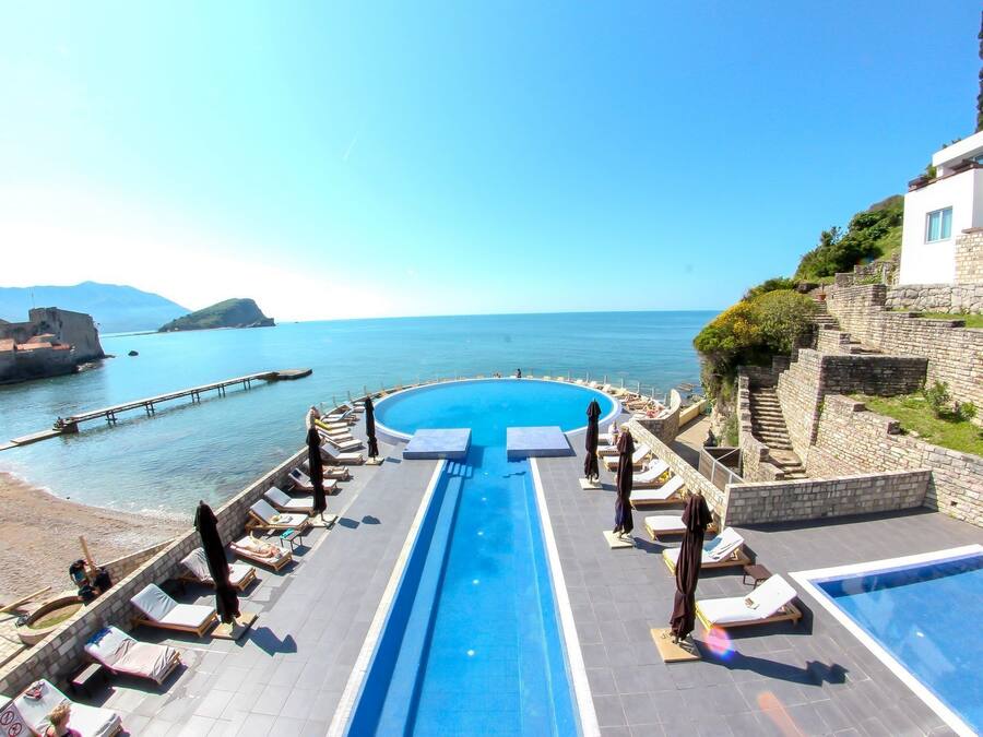 Indoor pool, 2 outdoor pools, open 8 AM to 9 PM, pool umbrellas