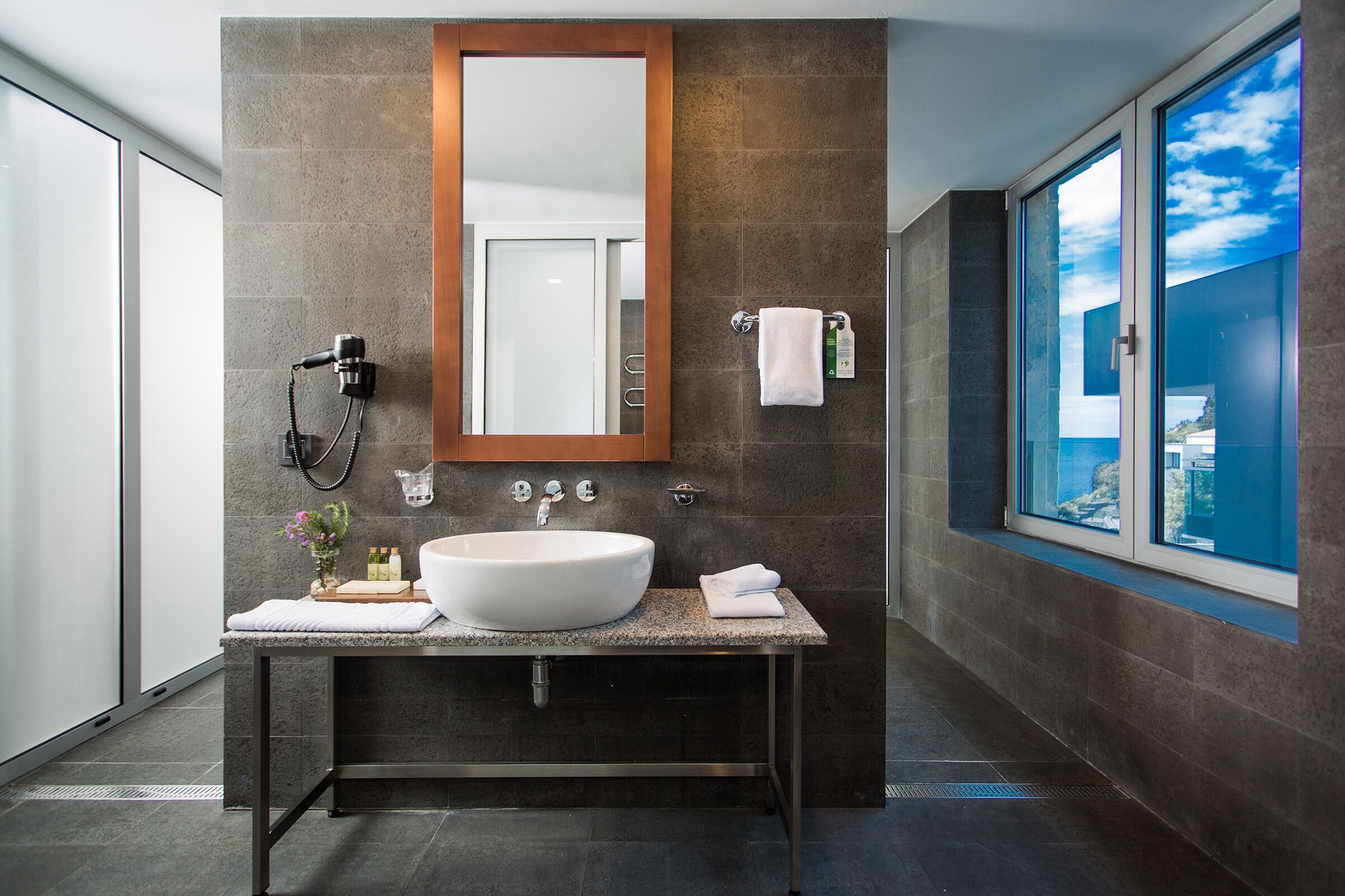 luxury suite, balcony, sea view | bathroom | rainfall showerhead, designer toiletries, hair dryer, bathrobes