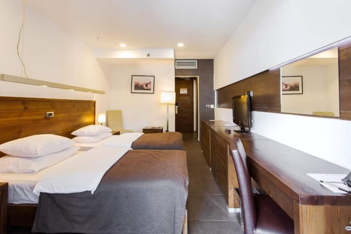 Premium bedding, minibar, in-room safe, desk