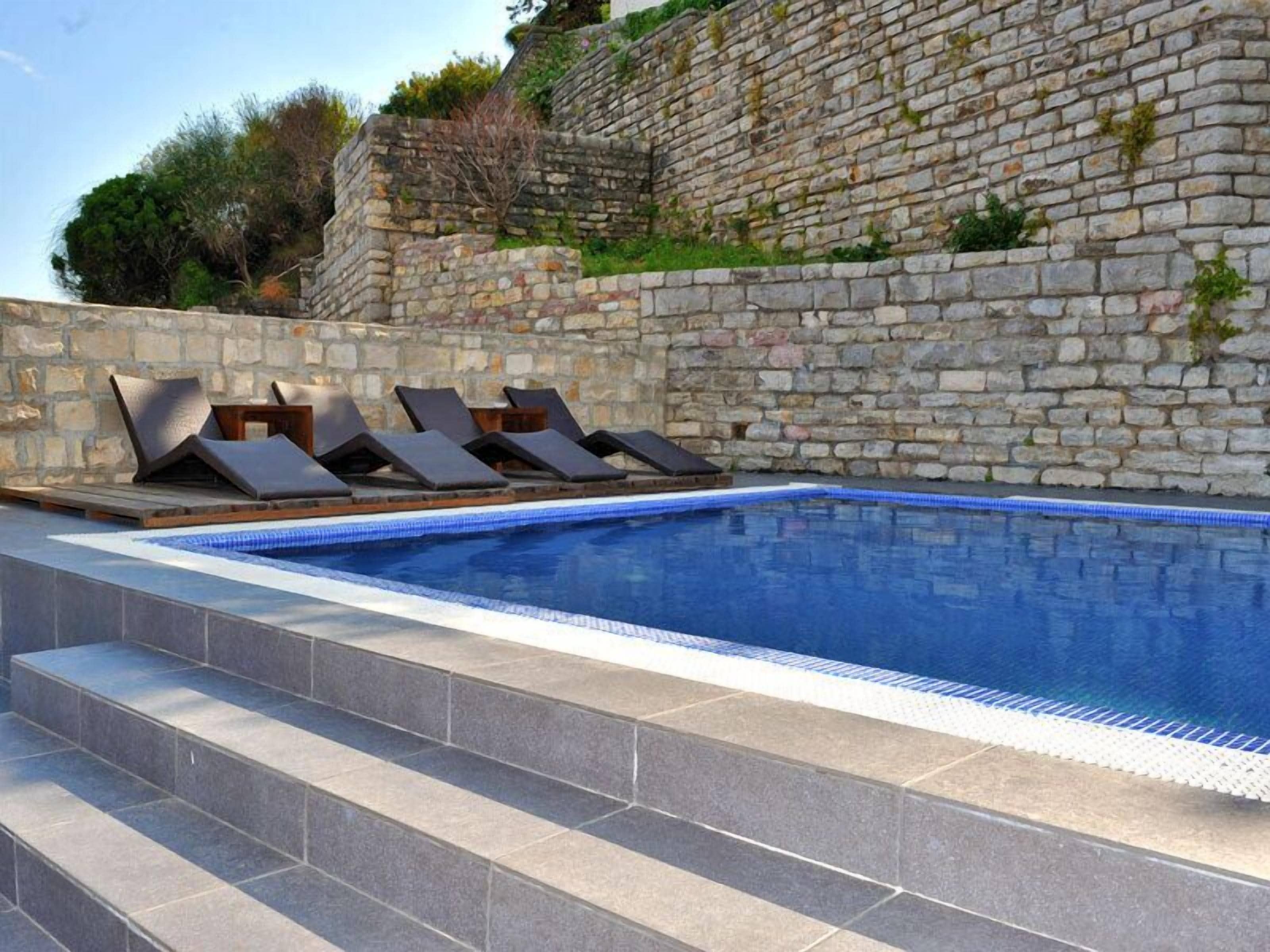 indoor pool, 2 outdoor pools, open 8 am to 9 pm, pool umbrellas