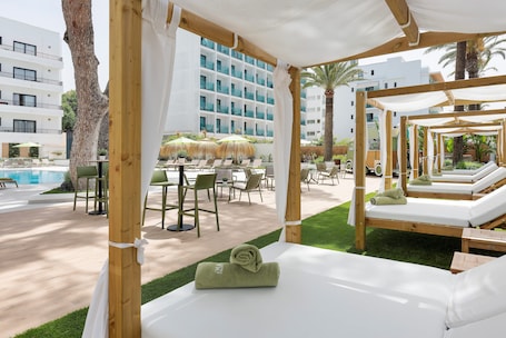 Outdoor pool, open 9:00 AM to 8:00 PM, pool umbrellas, sun loungers