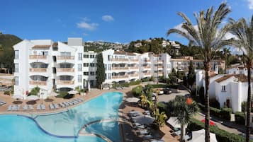 Indoor pool, seasonal outdoor pool, pool umbrellas, sun loungers