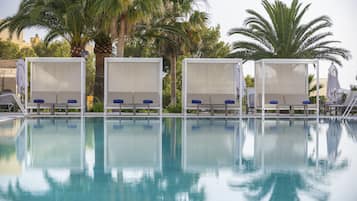 Outdoor pool, cabanas (surcharge), pool umbrellas