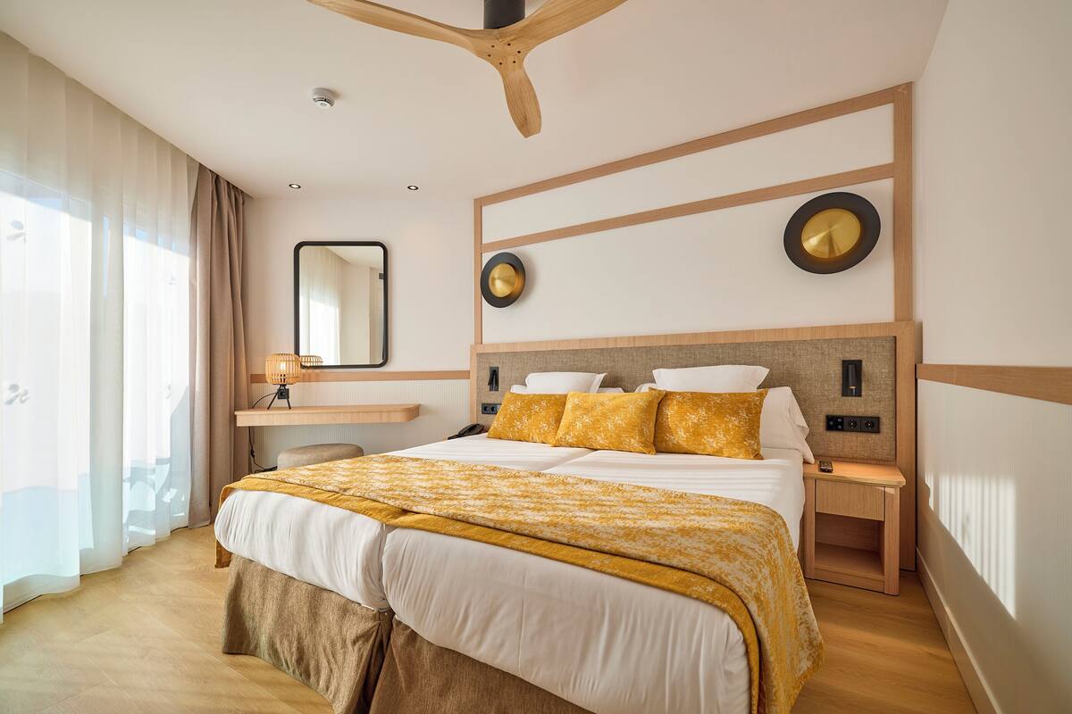In-room safe, laptop workspace, WiFi (free), bed sheets