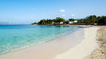 On the beach, white sand