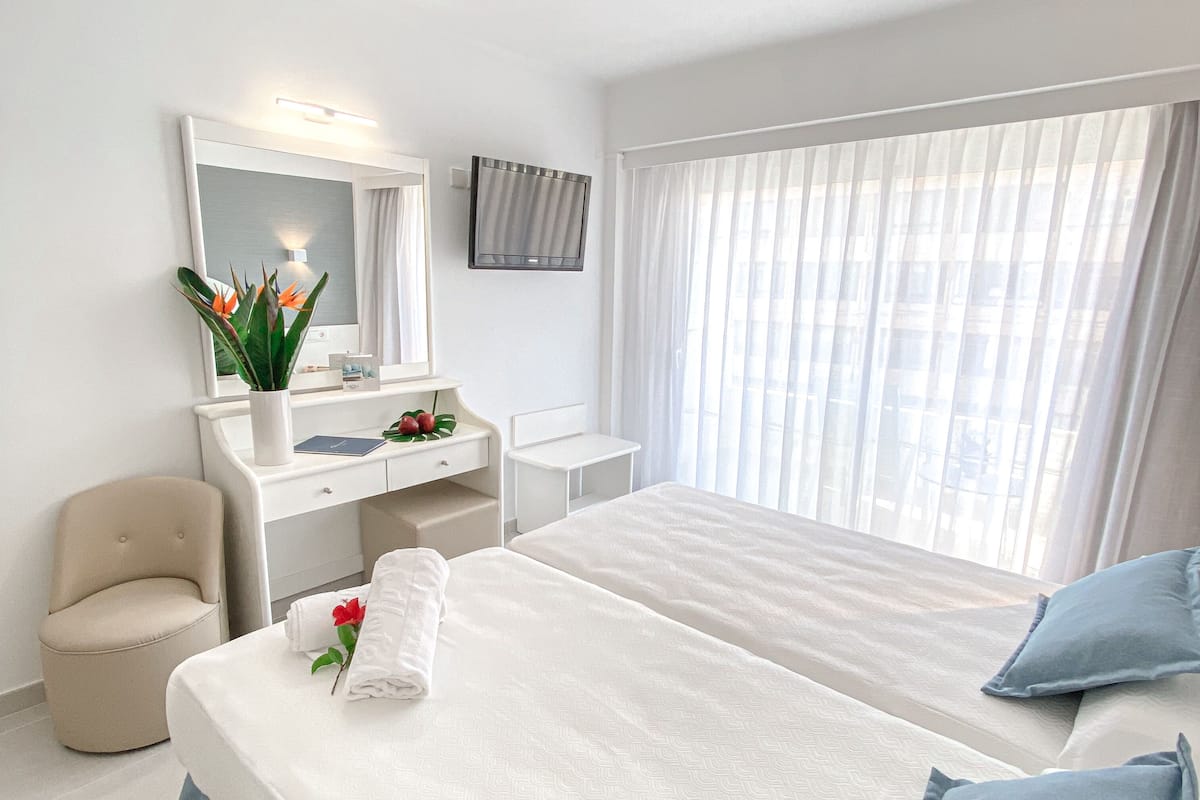 Ropa de cama de alta calidad y minibar