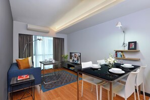 Deluxe Apartment, 2 Bedrooms | Living area | LCD TV - Citadines Sukhumvit 11 Bangkok (Bangkok)