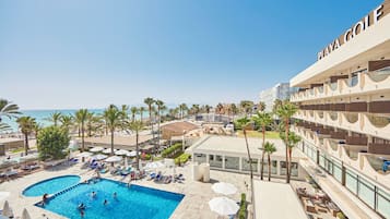 Habitación doble, balcón, vista al mar | Ropa de cama de alta calidad y minibar