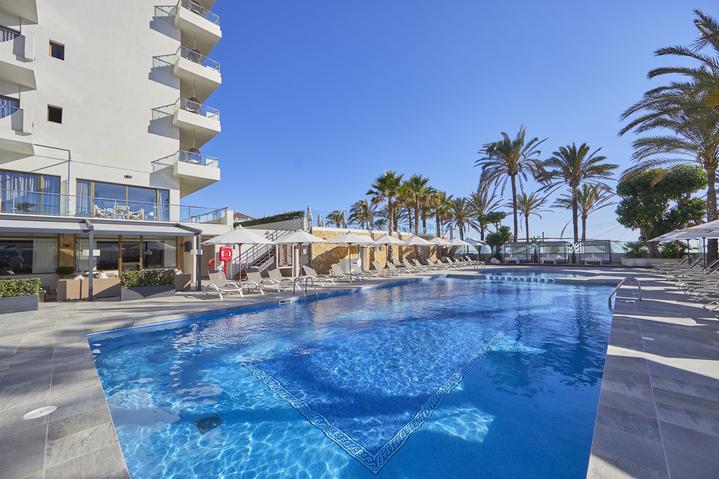 outdoor pool, pool umbrellas, pool loungers