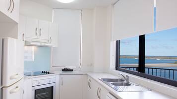 Fridge, microwave, stovetop, coffee/tea maker