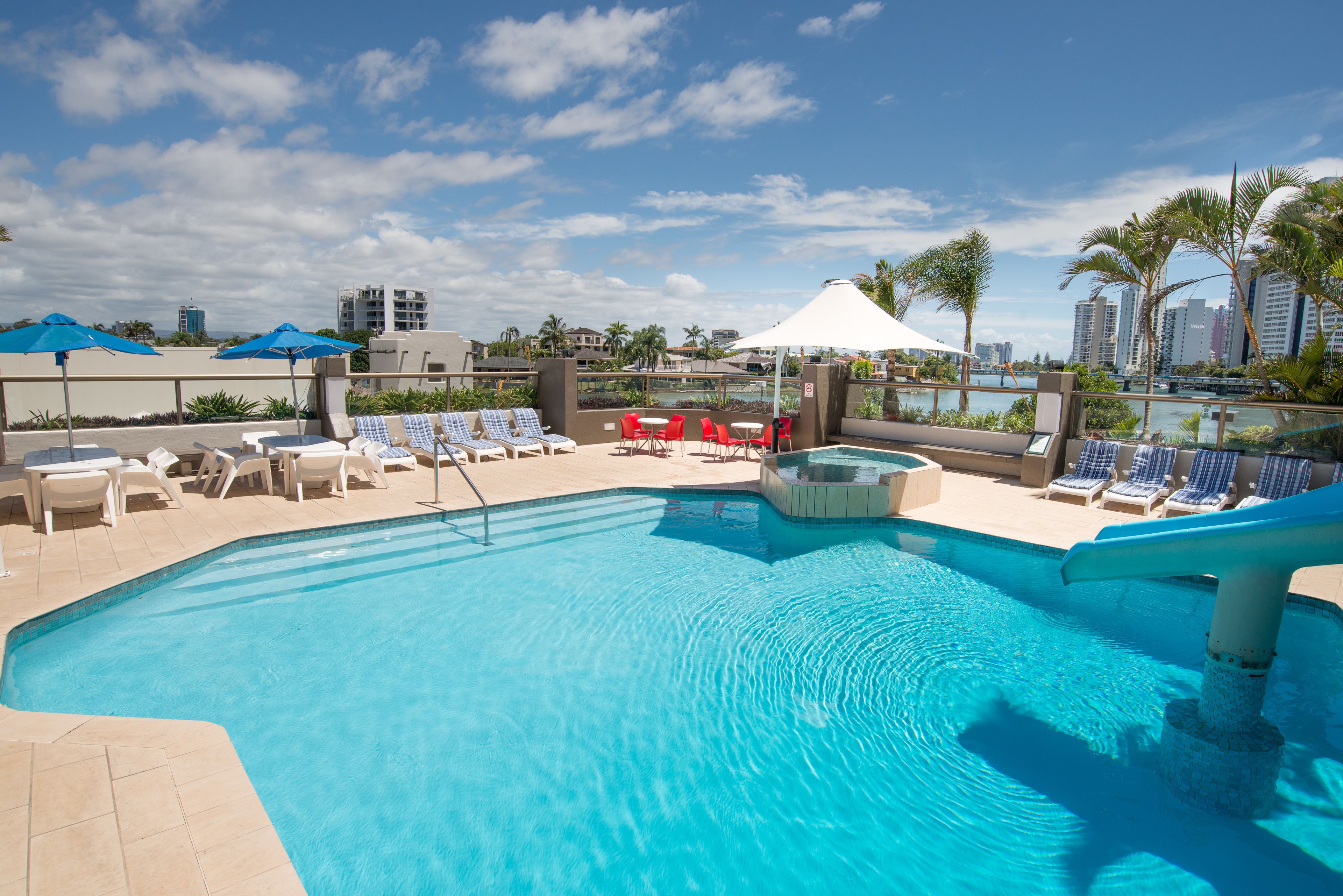 Outdoor pool, open 8:00 AM to 7:00 PM, pool loungers
