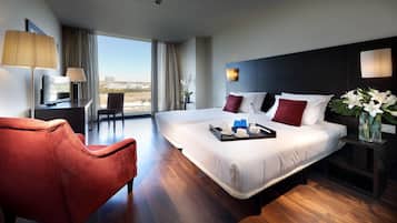 Luxe beddengoed, donsdekens, een minibar, een kluis op de kamer