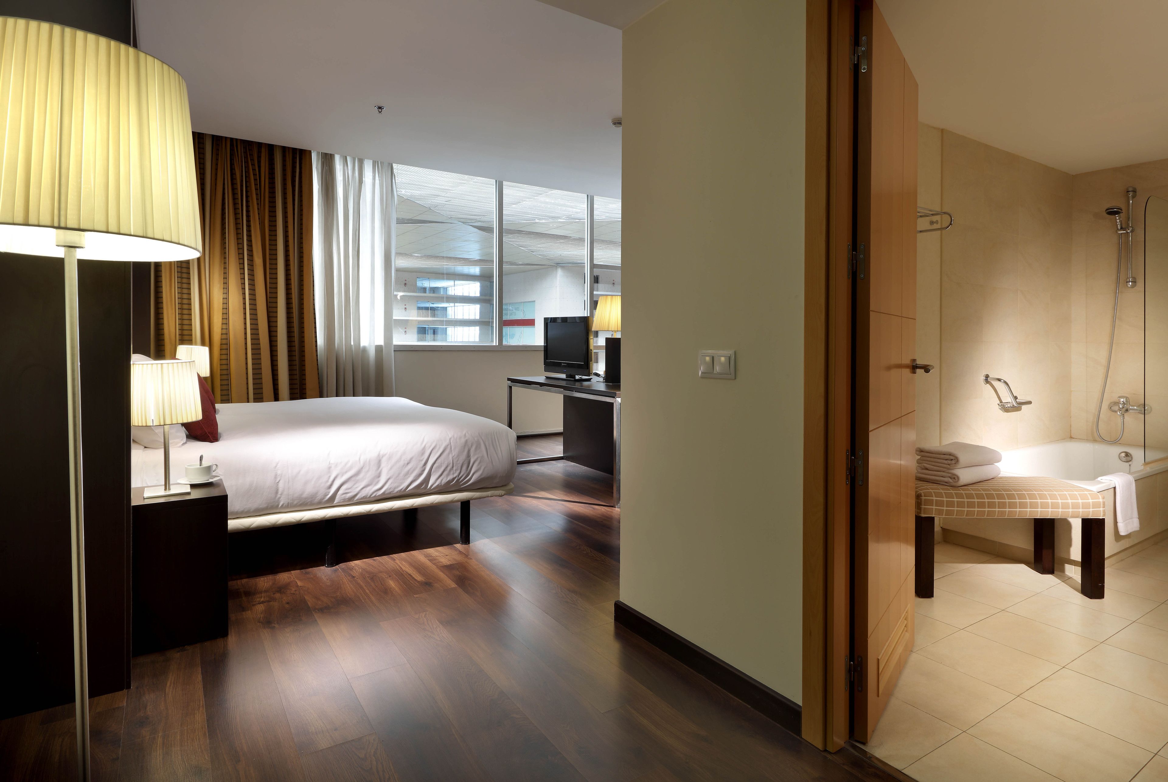 premium bedding, down duvets, minibar, in-room safe