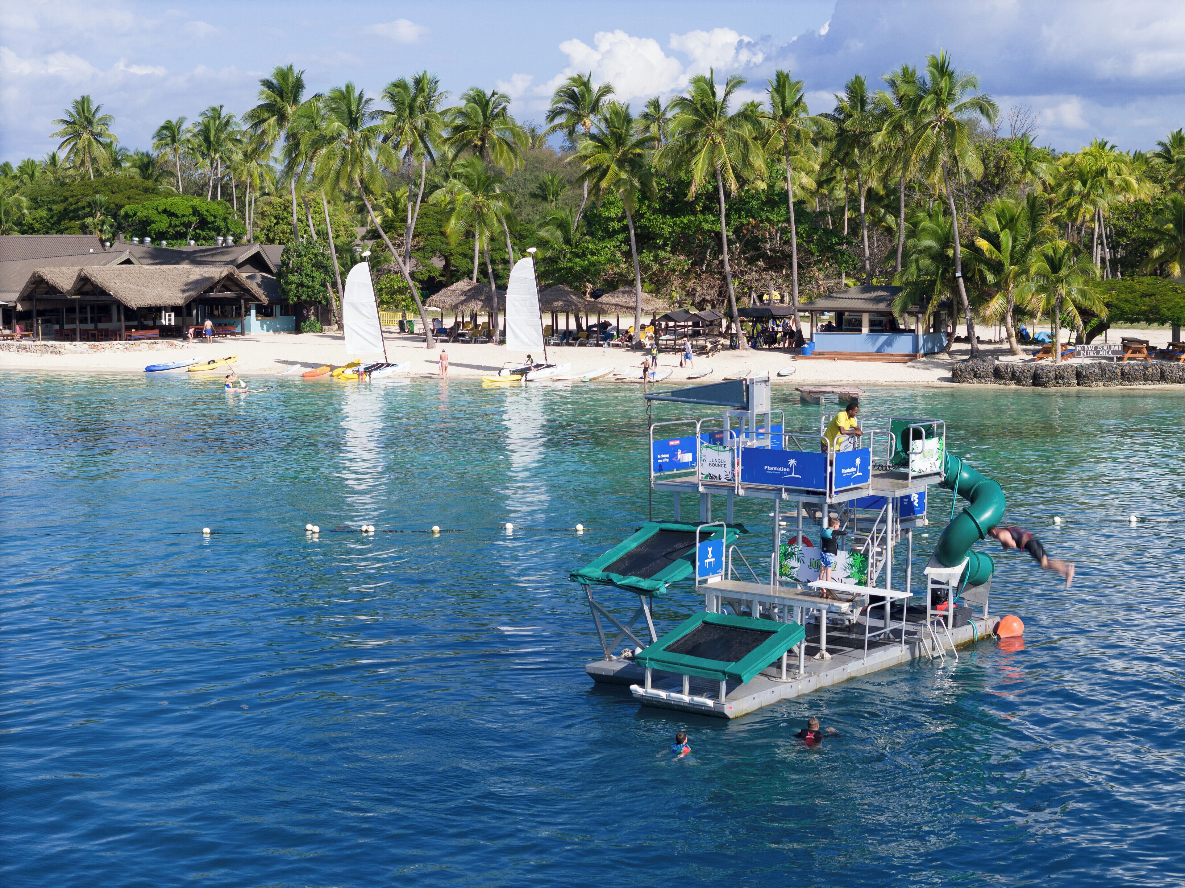 Private beach, white sand, sun loungers, beach umbrellas