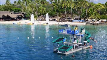 Private beach, white sand, sun-loungers, beach umbrellas
