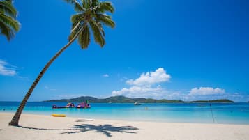 Private beach, white sand, sun loungers, beach umbrellas