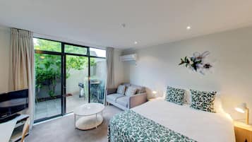 Suíte família, banheira de hidromassagem | 1 quarto, roupas de cama premium, quartos à prova de som