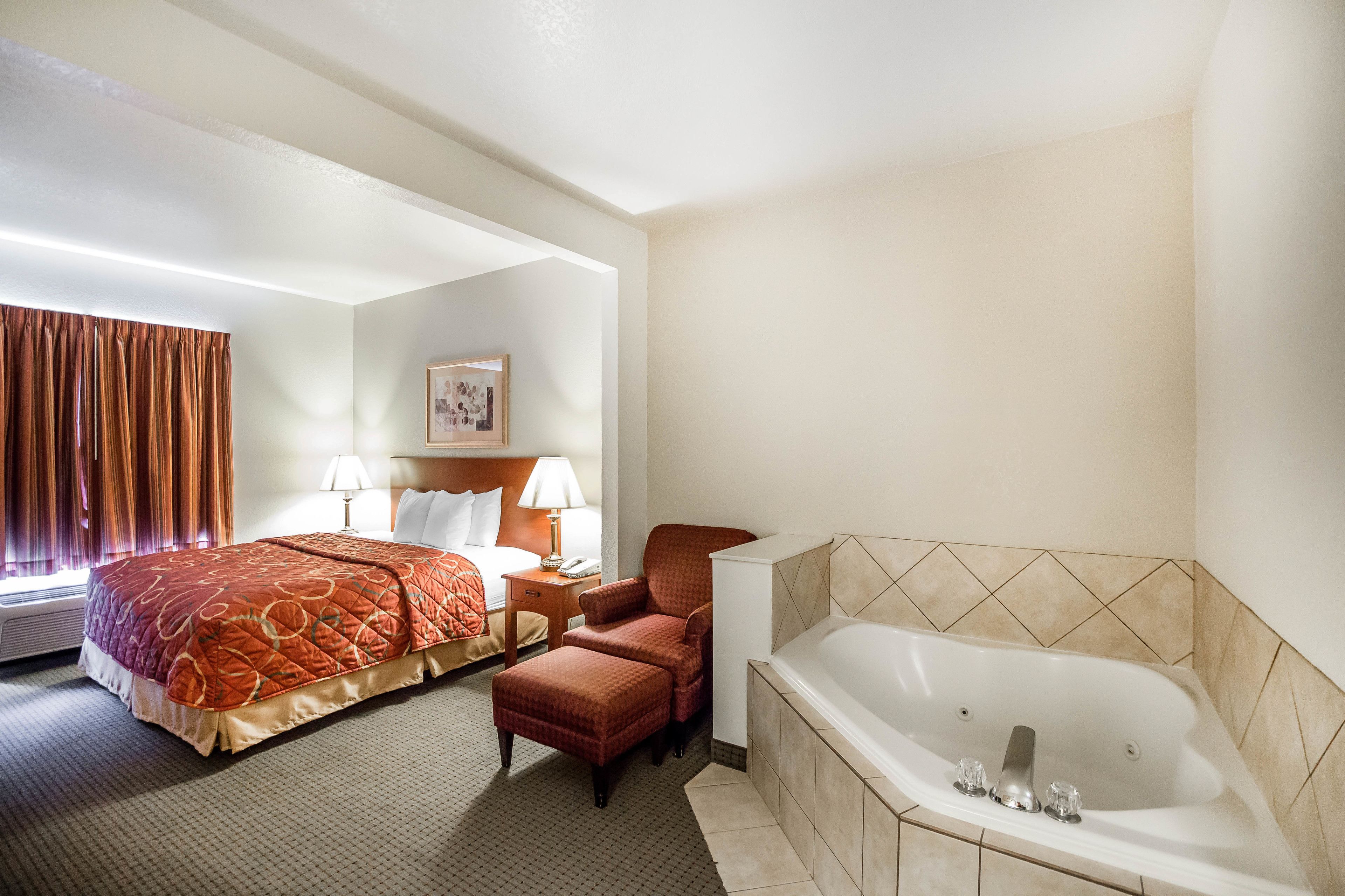 suite, 1 king bed, non smoking, jetted tub | 1 bedroom, free wifi, bed sheets