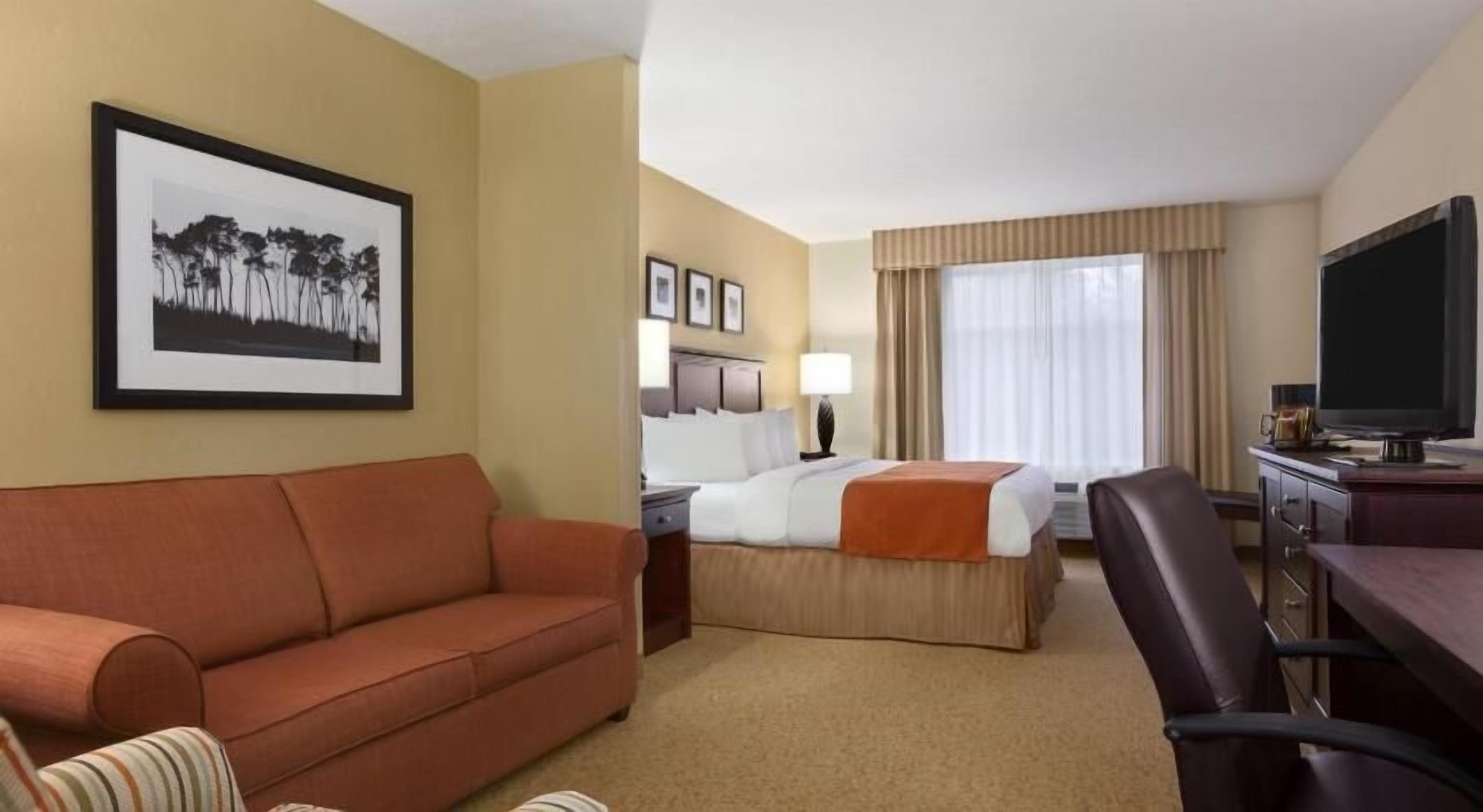 Premium bedding, desk, blackout drapes, iron/ironing board