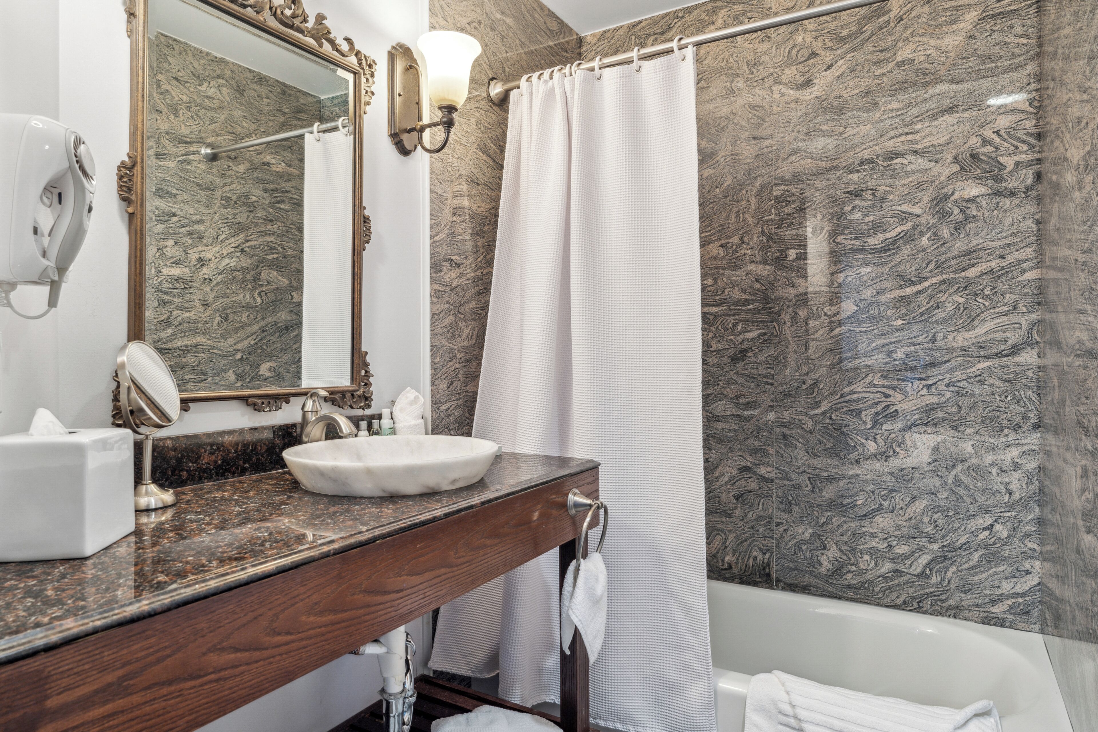 superior room, 1 king bed (premium king room) | bathroom | combined shower/bathtub, designer toiletries, hair dryer, towels