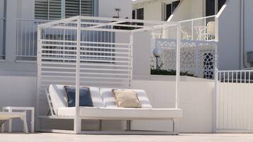 Outdoor pool, open 8:00 AM to 9:00 PM, pool umbrellas, sun loungers