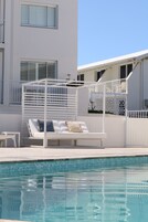 Outdoor pool, open 8:00 AM to 9:00 PM, pool umbrellas, sun loungers