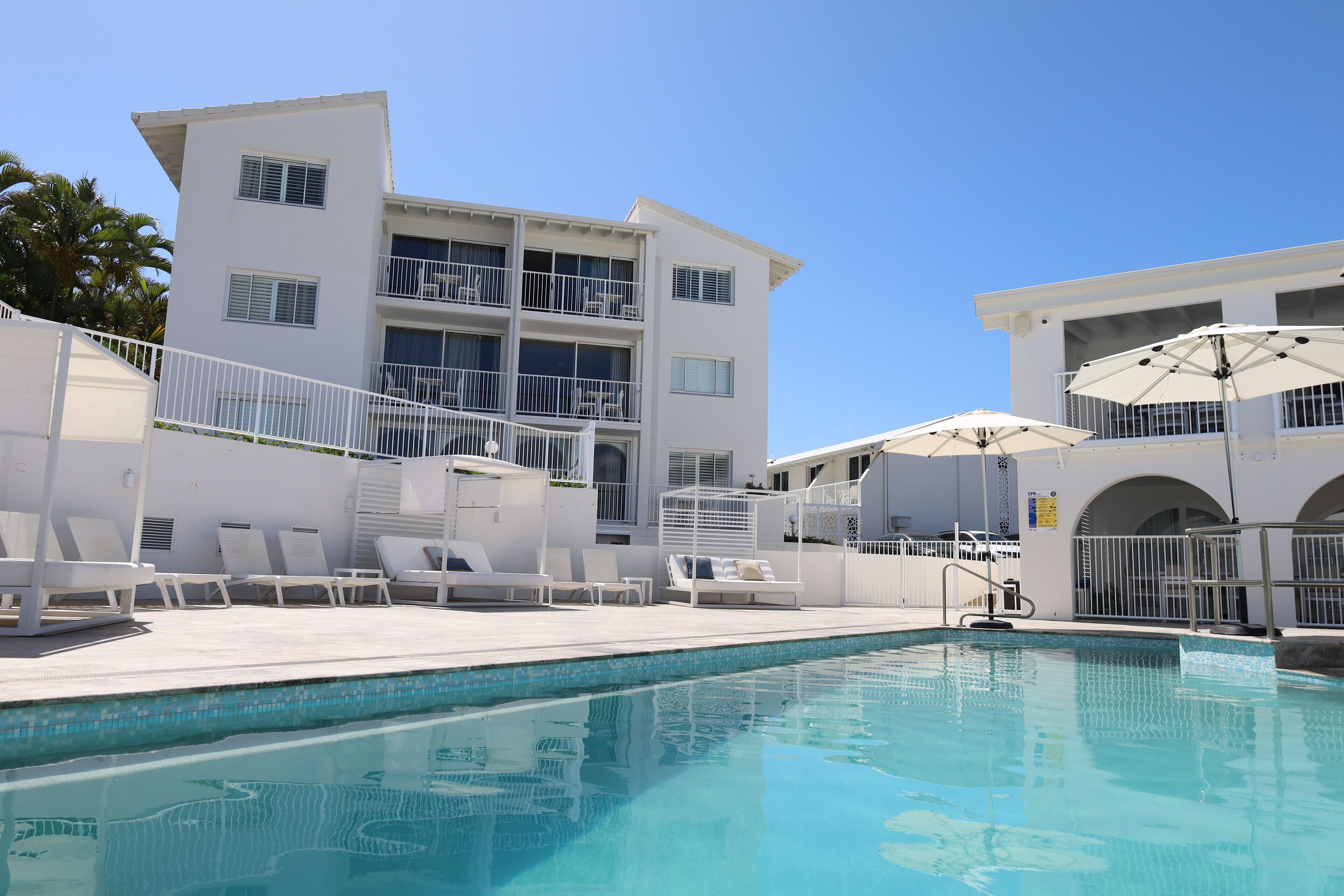 Outdoor pool, open 8:00 AM to 9:00 PM, pool umbrellas, pool loungers