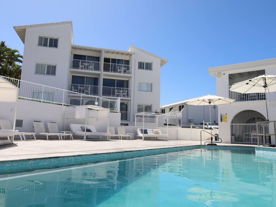 Outdoor pool, open 8:00 AM to 9:00 PM, pool umbrellas, sun loungers