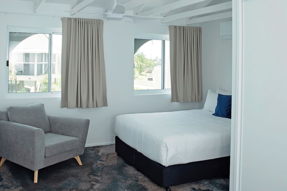 Executive appartement, 3 slaapkamers | 2 slaapkamers, verduisterende gordijnen, een strijkplank/strijkijzer