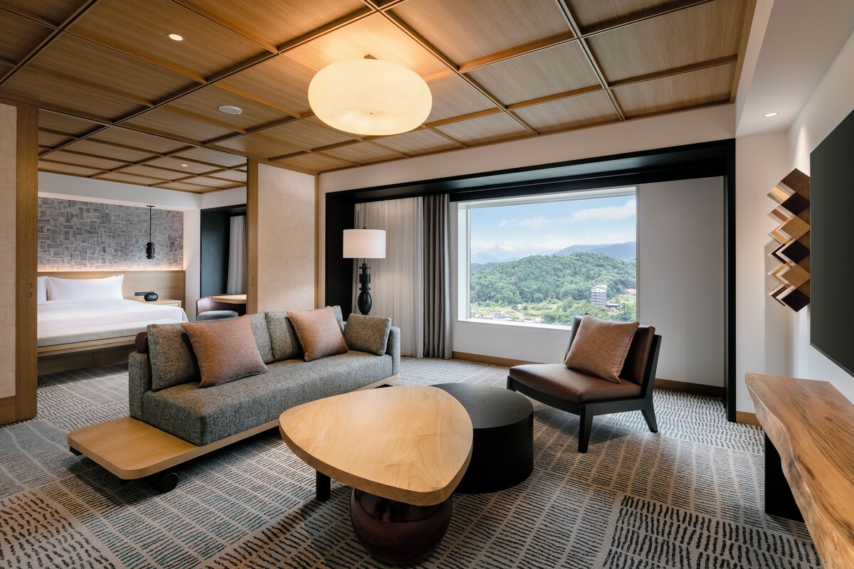 King Room, Deluxe Suite | Down comforters, in-room safe, desk, blackout drapes