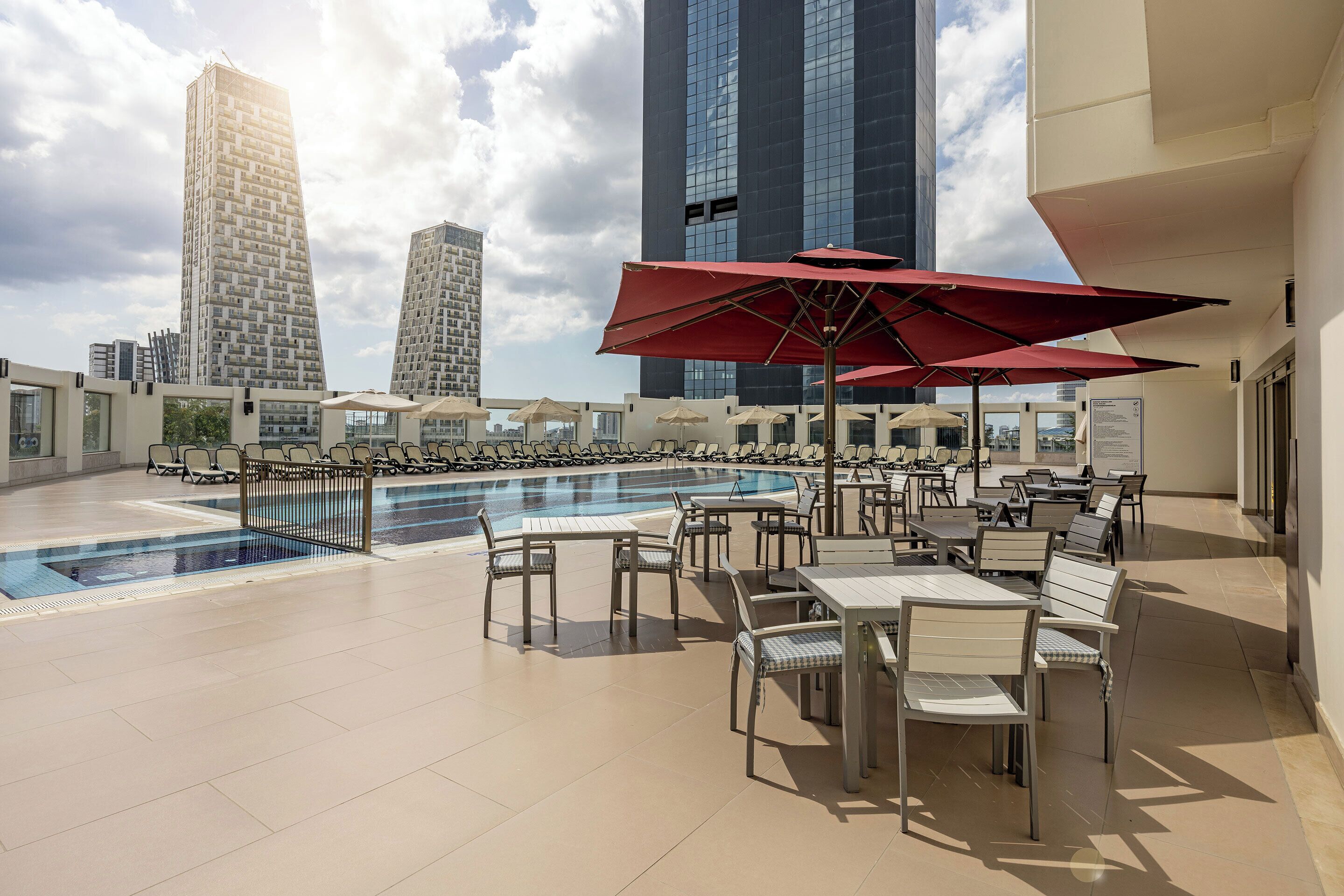 Seasonal outdoor pool, pool loungers