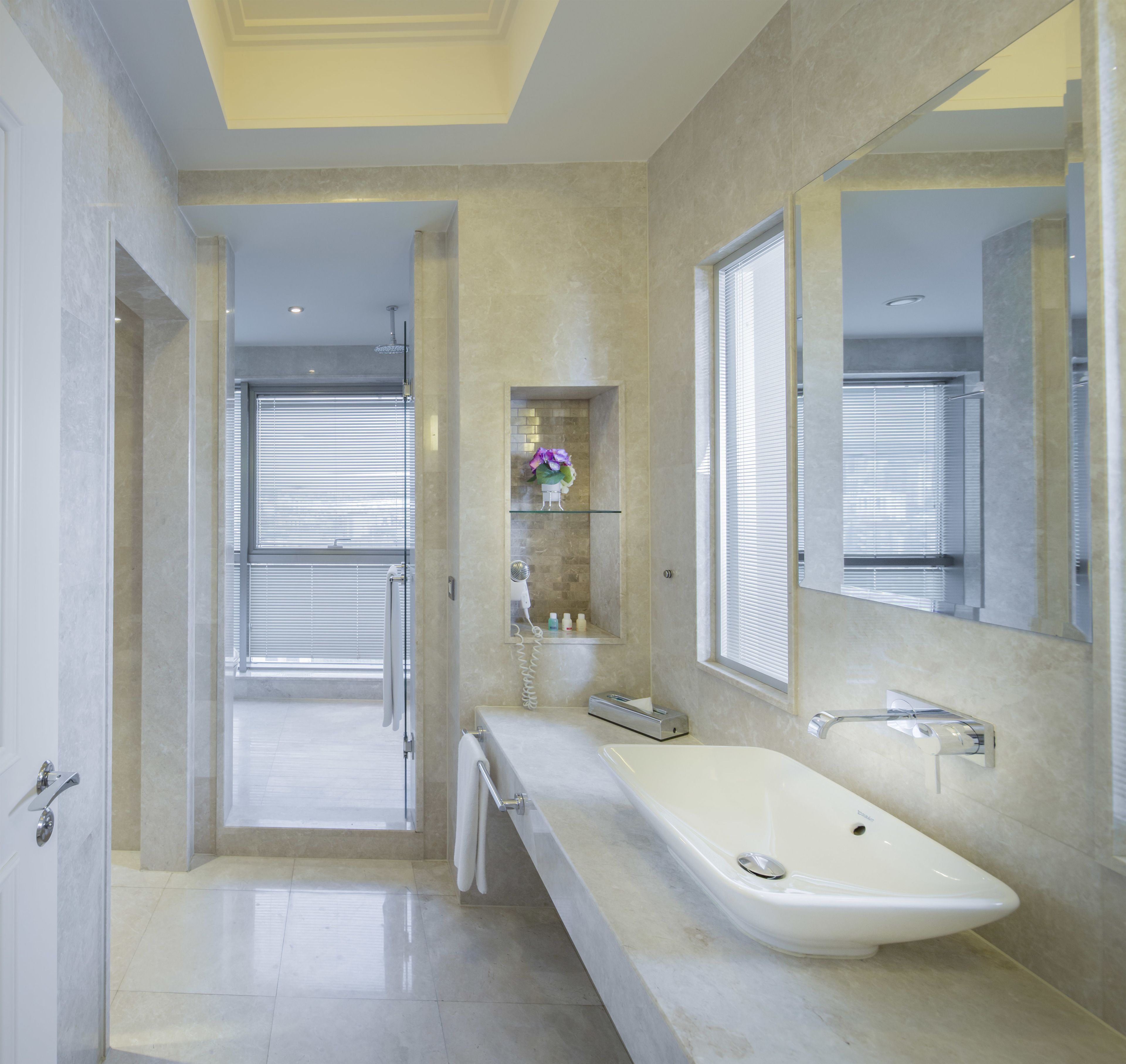 deluxe room | bathroom | free toiletries, hair dryer, slippers, towels