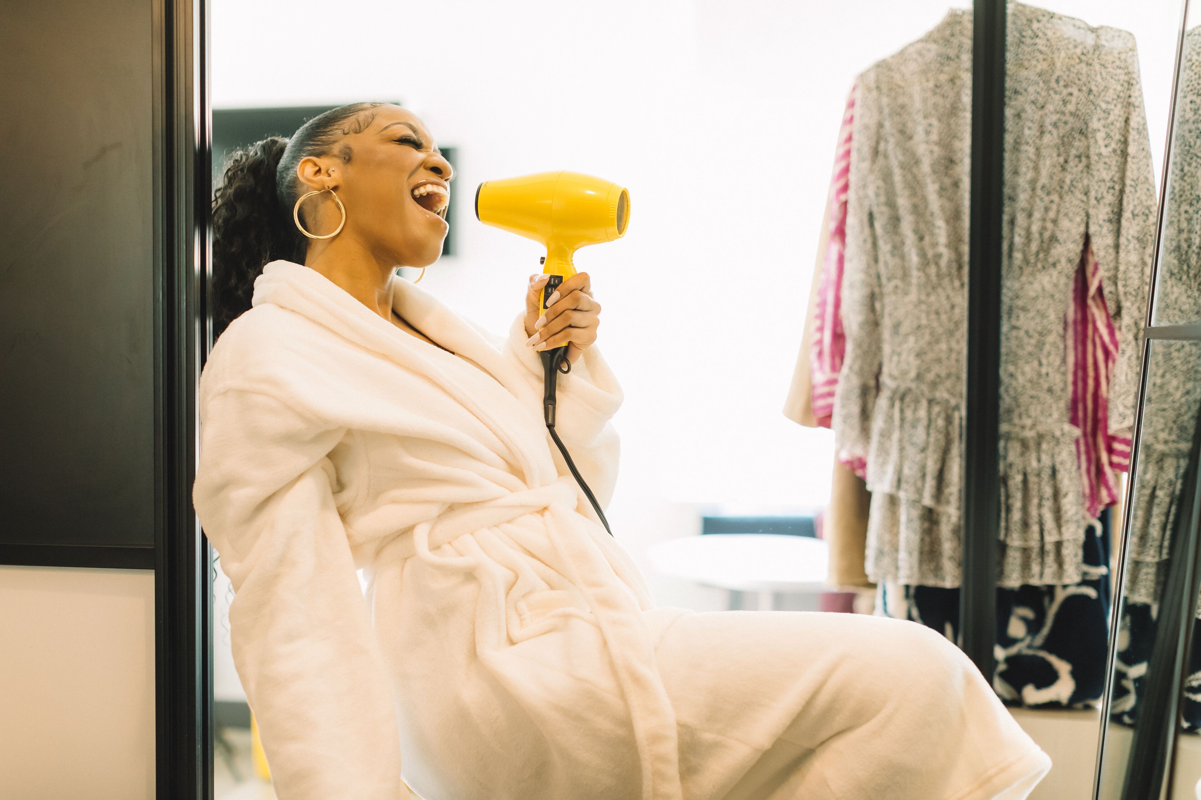 shower, designer toiletries, hair dryer, towels