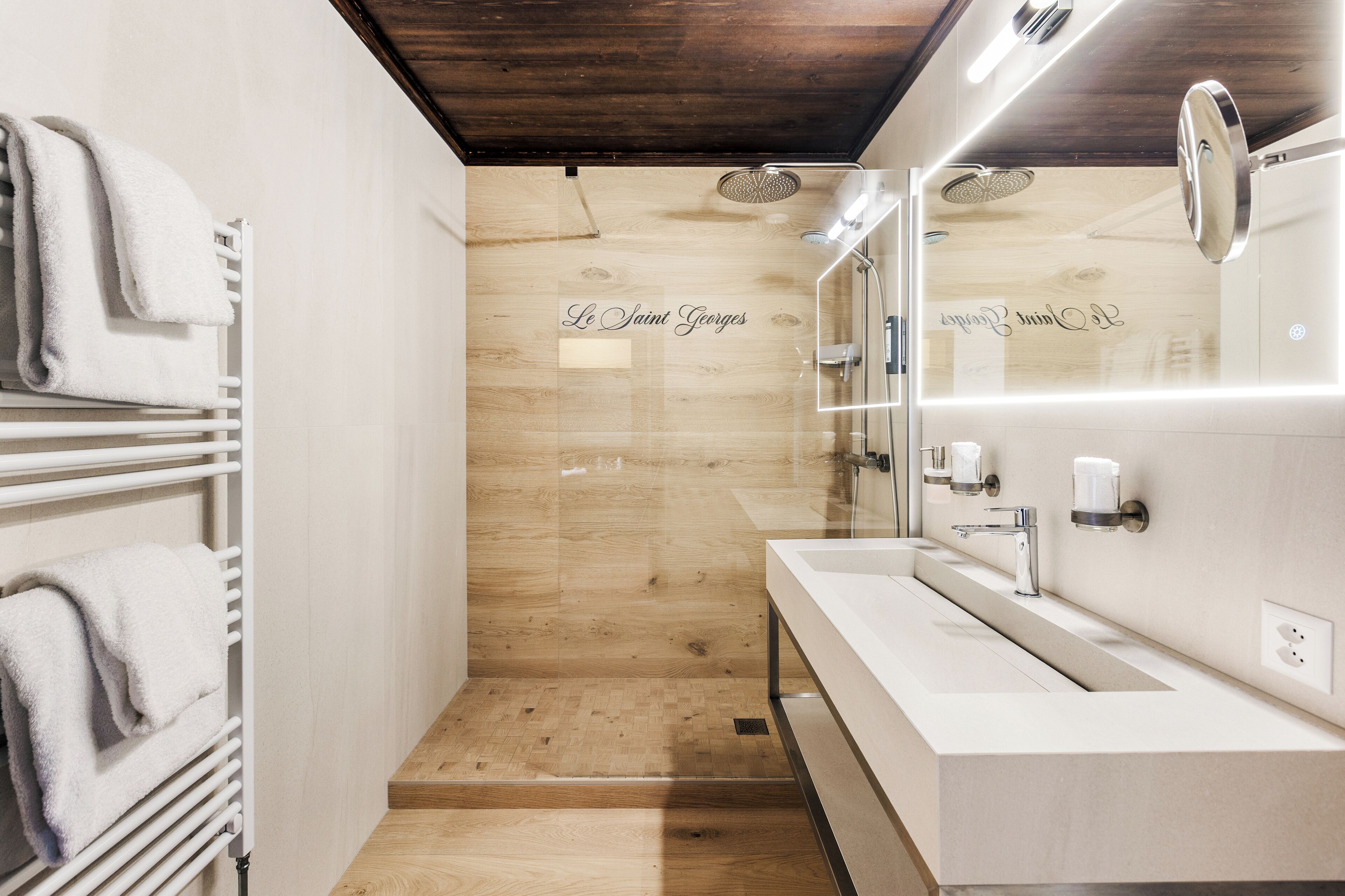 junior suite | bathroom | shower, free toiletries, hair dryer, towels