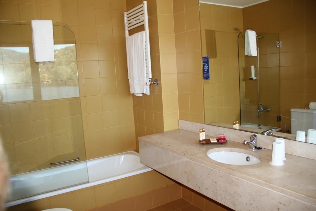 free toiletries, hair dryer, bidet, towels