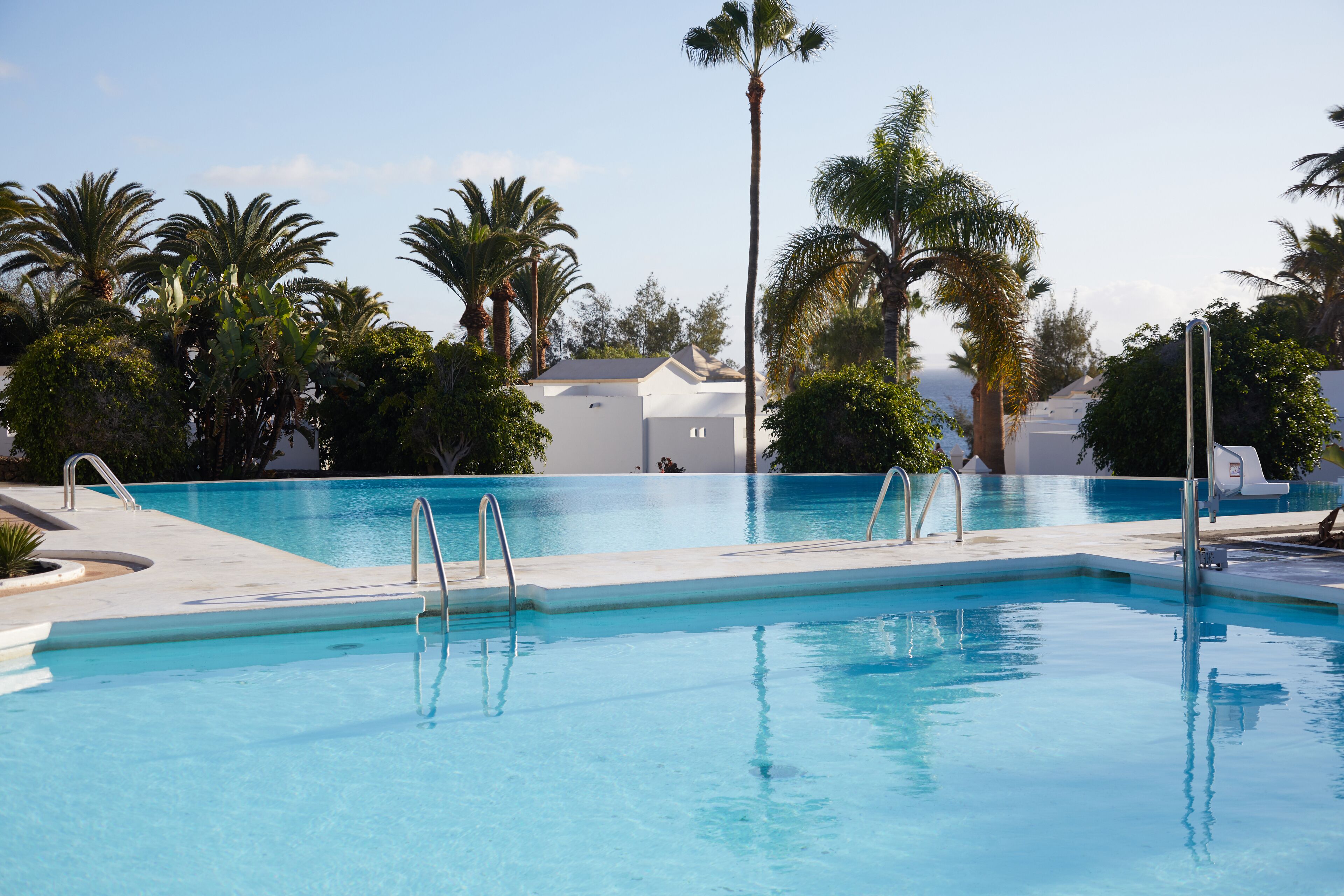 Outdoor pool, pool umbrellas, sun loungers