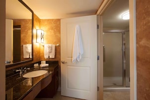 Bedroom Suite-King Bed | Bathroom | Designer toiletries, hair dryer, towels