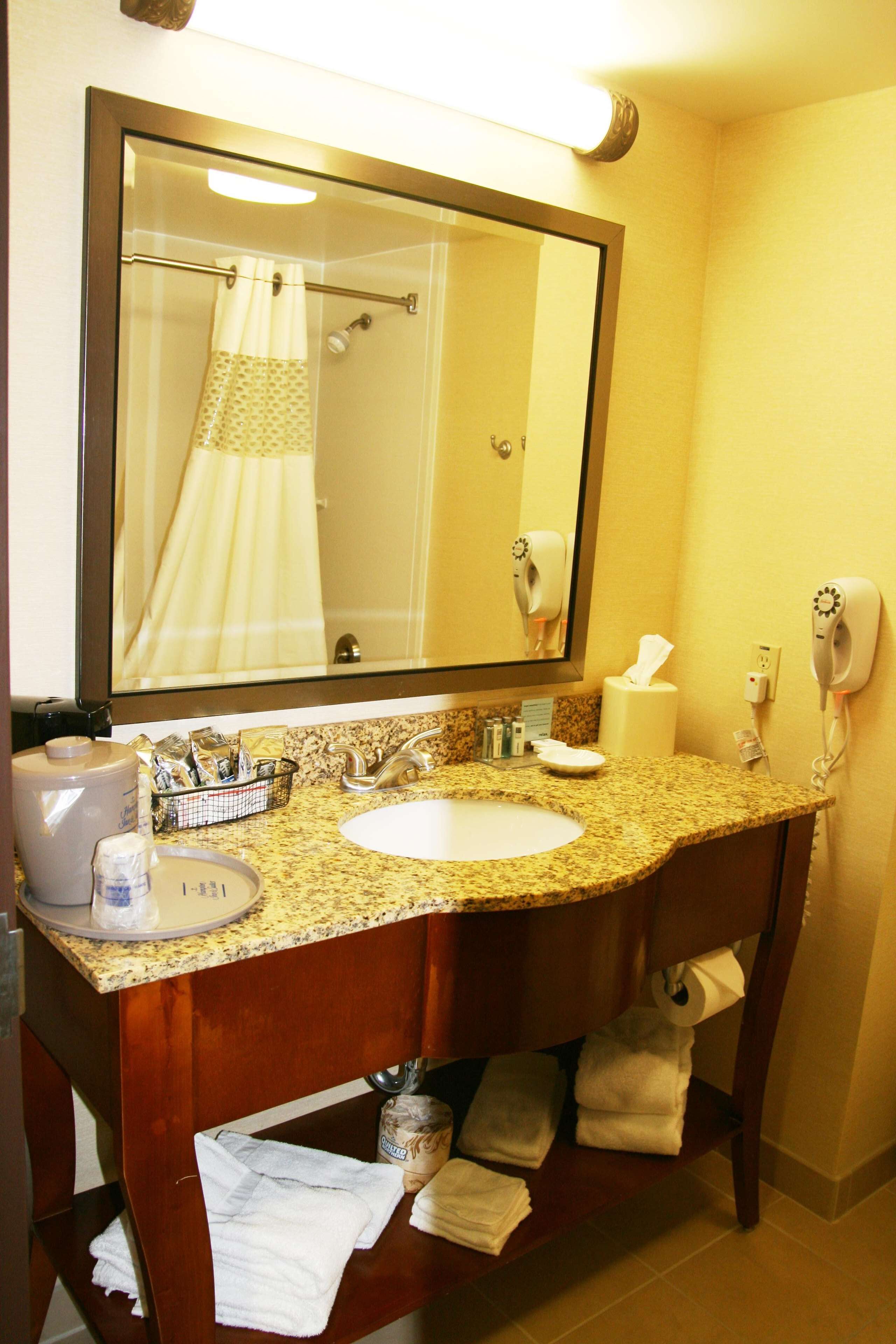 2 queen beds | bathroom | bathtub, hair dryer, towels