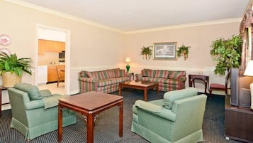 Standard Triple Room | Living room | 42-inch LED TV with cable channels, TV