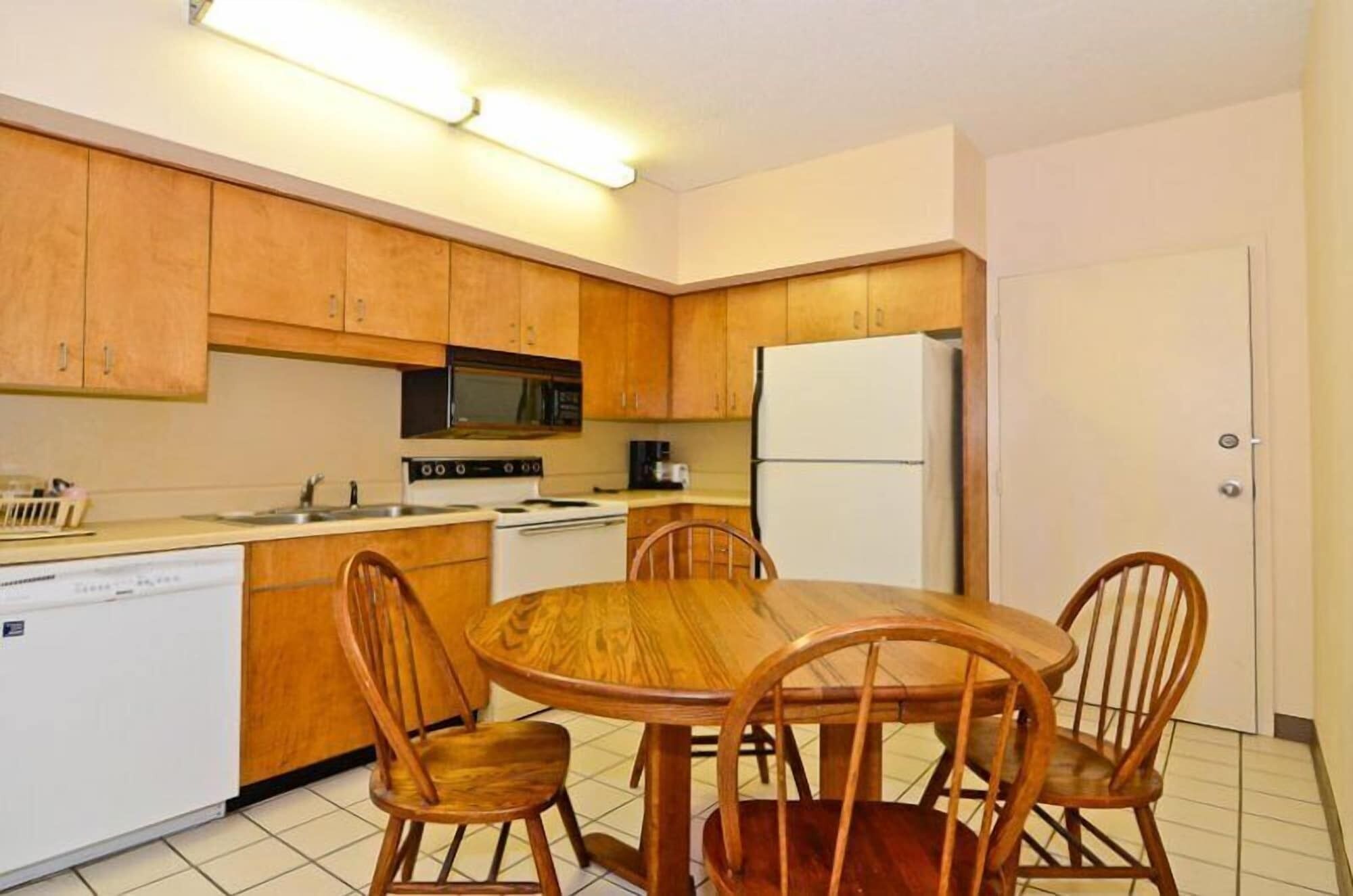 Superior Room, 2 Double Beds | Private kitchen | Fridge, microwave, coffee/tea maker