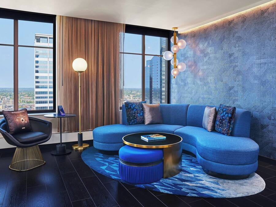 Suite, 1 King Bed | Living room | 37-inch LCD TV with cable channels, TV, DVD player