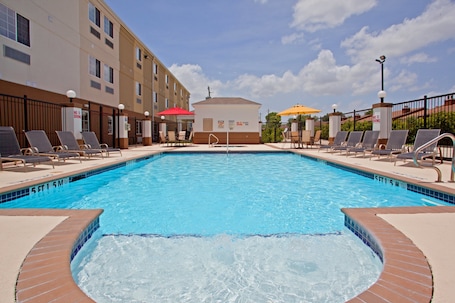 Outdoor pool. Candlewood Suites Houston Westchase/ Westheimer. by IHG