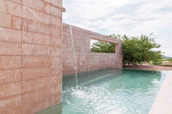 Seasonal outdoor pool, open 11 AM to 9 PM, pool umbrellas, pool loungers