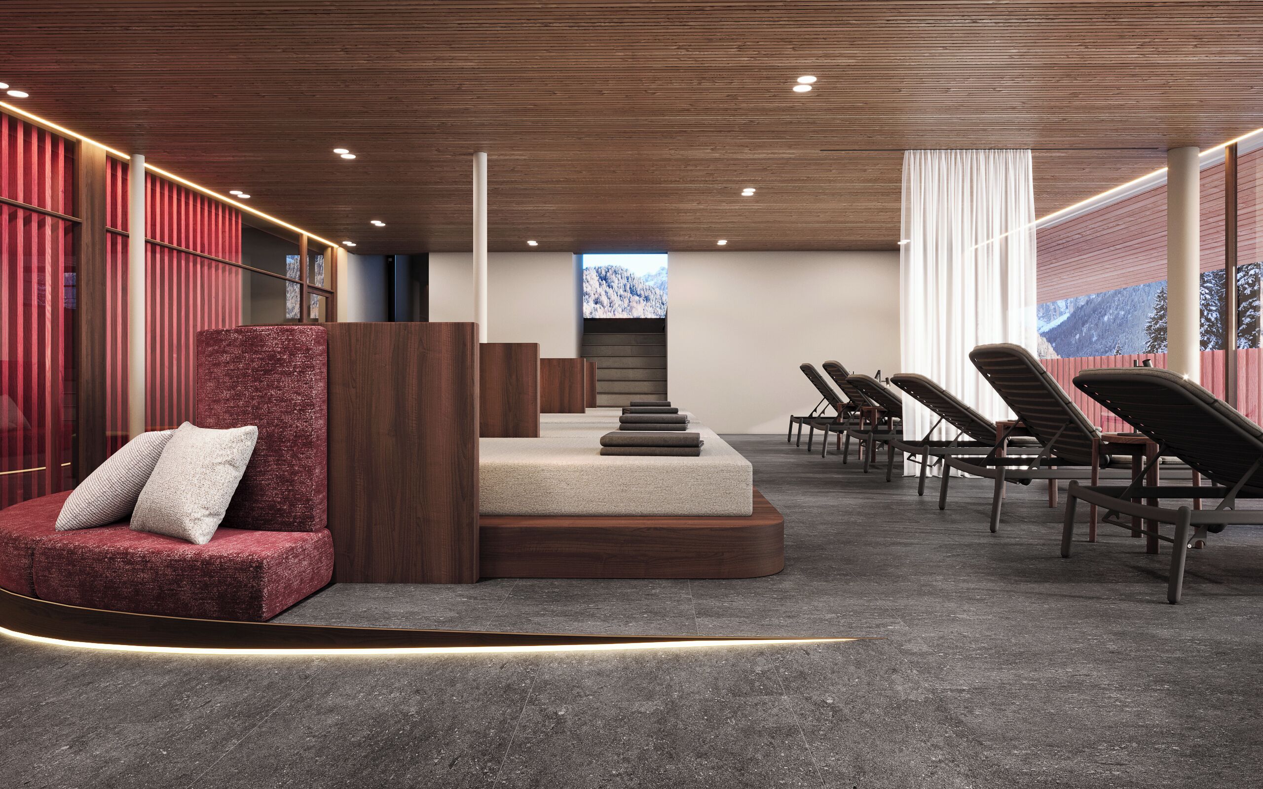 Un área de descanso moderna con un espacio de asientos acolchado de color rojo, un mostrador de recepción de madera y una fila de sillones.