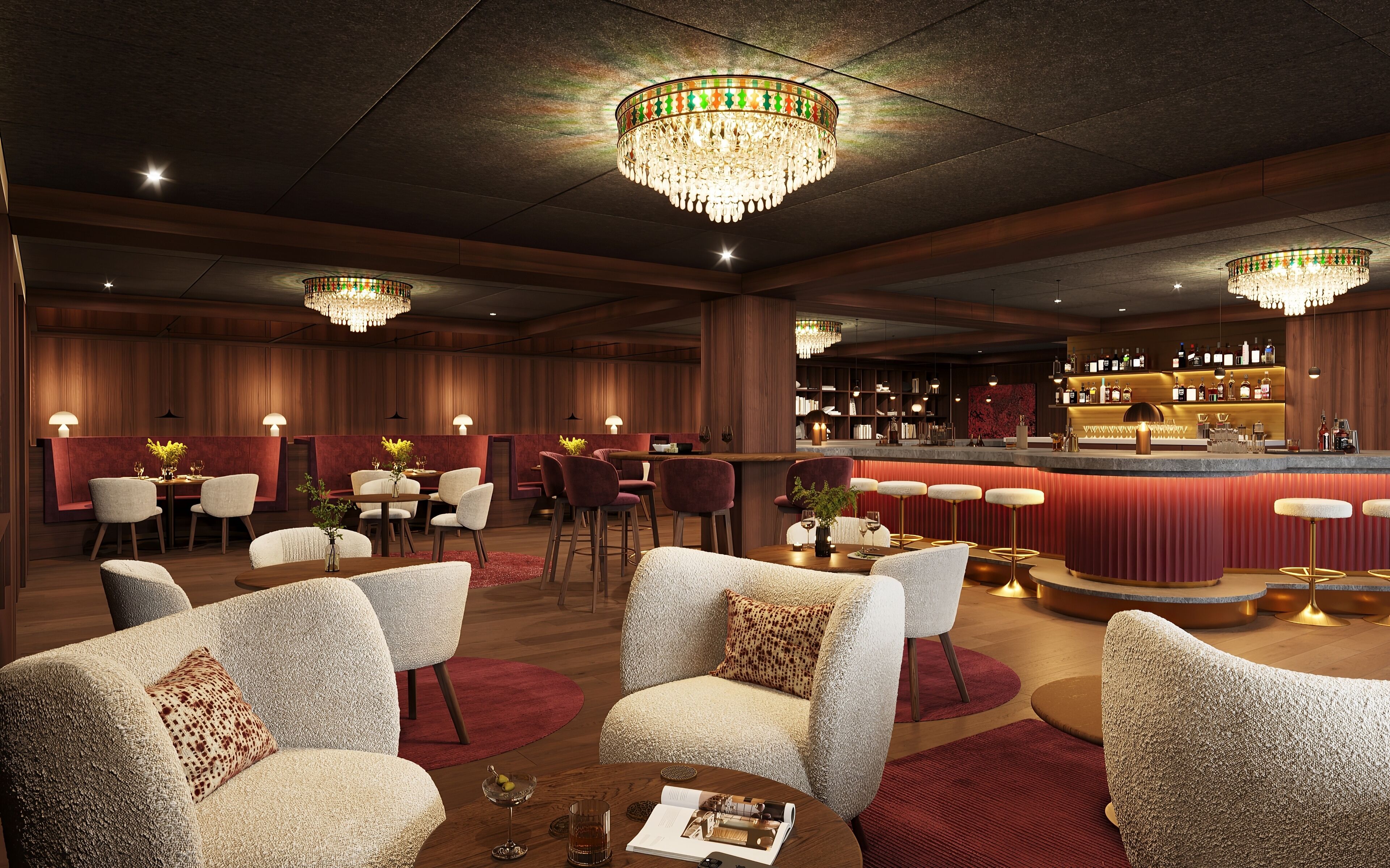 A modern bar area with high stools, a bar counter, and a chandelier.
