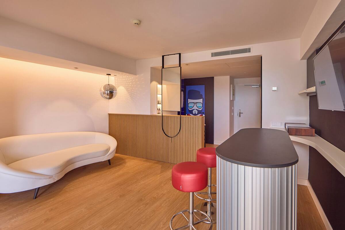 suite, sea view (lateral) | living area | 40-inch flat-screen tv with satellite channels, tv