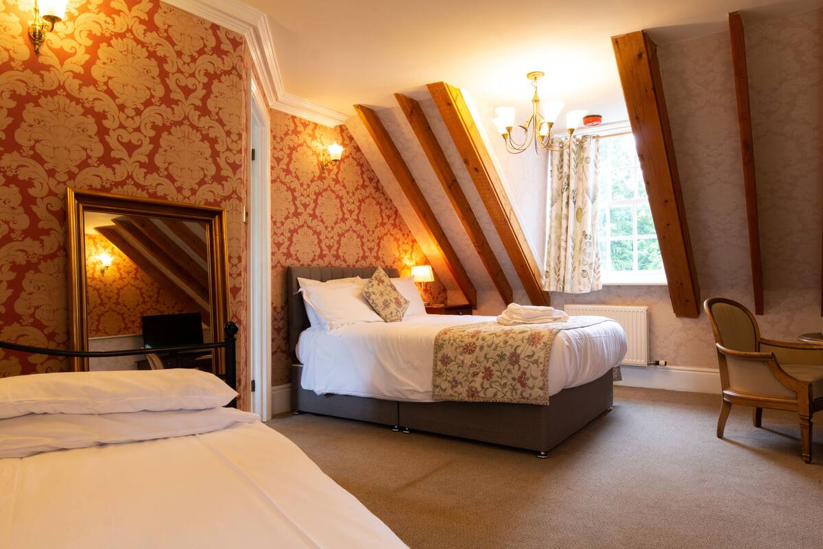 deluxe family room | 1 bedroom, premium bedding, in-room safe, individually decorated