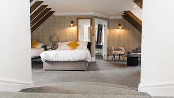 Deluxe Family Room | Premium bedding, in-room safe, individually decorated, free WiFi