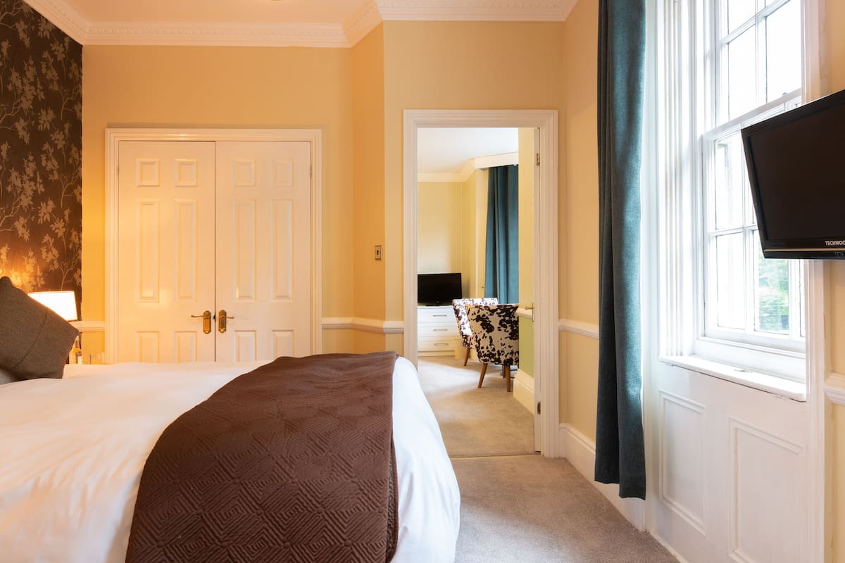family room | 1 bedroom, premium bedding, in-room safe, individually decorated