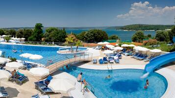 Outdoor pool, pool umbrellas, pool loungers